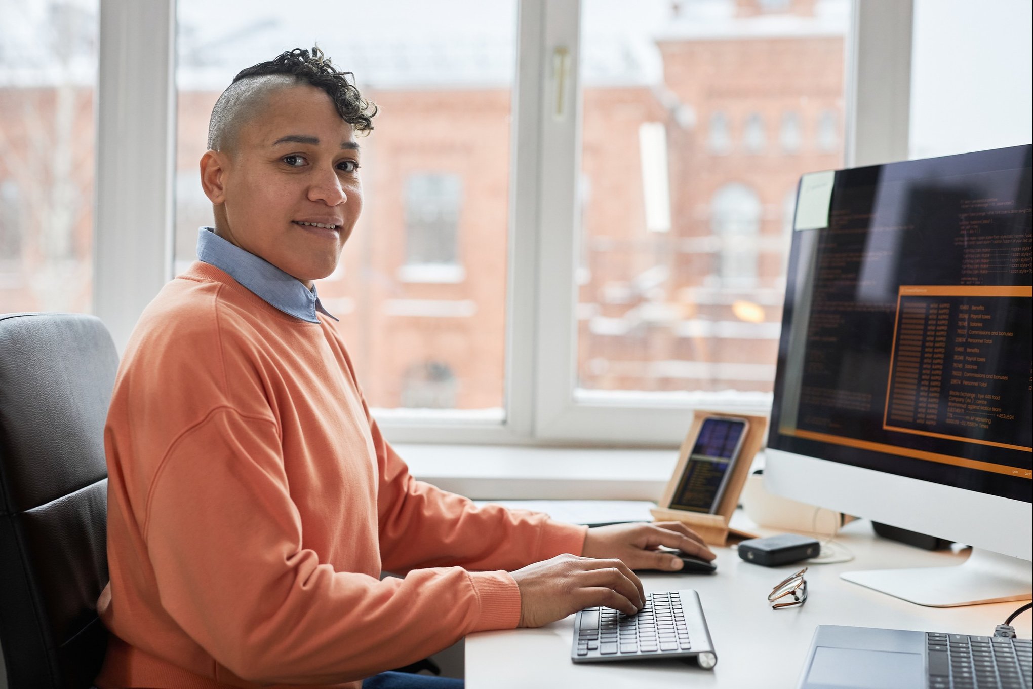 woman sitting at a computer
