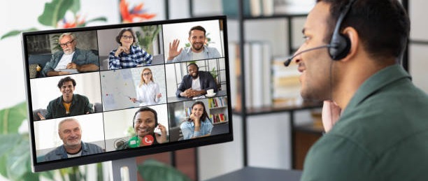 A man interacting with a professional development group online 