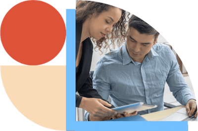 woman halping a man on a tablet device woman halping a man on a tablet device